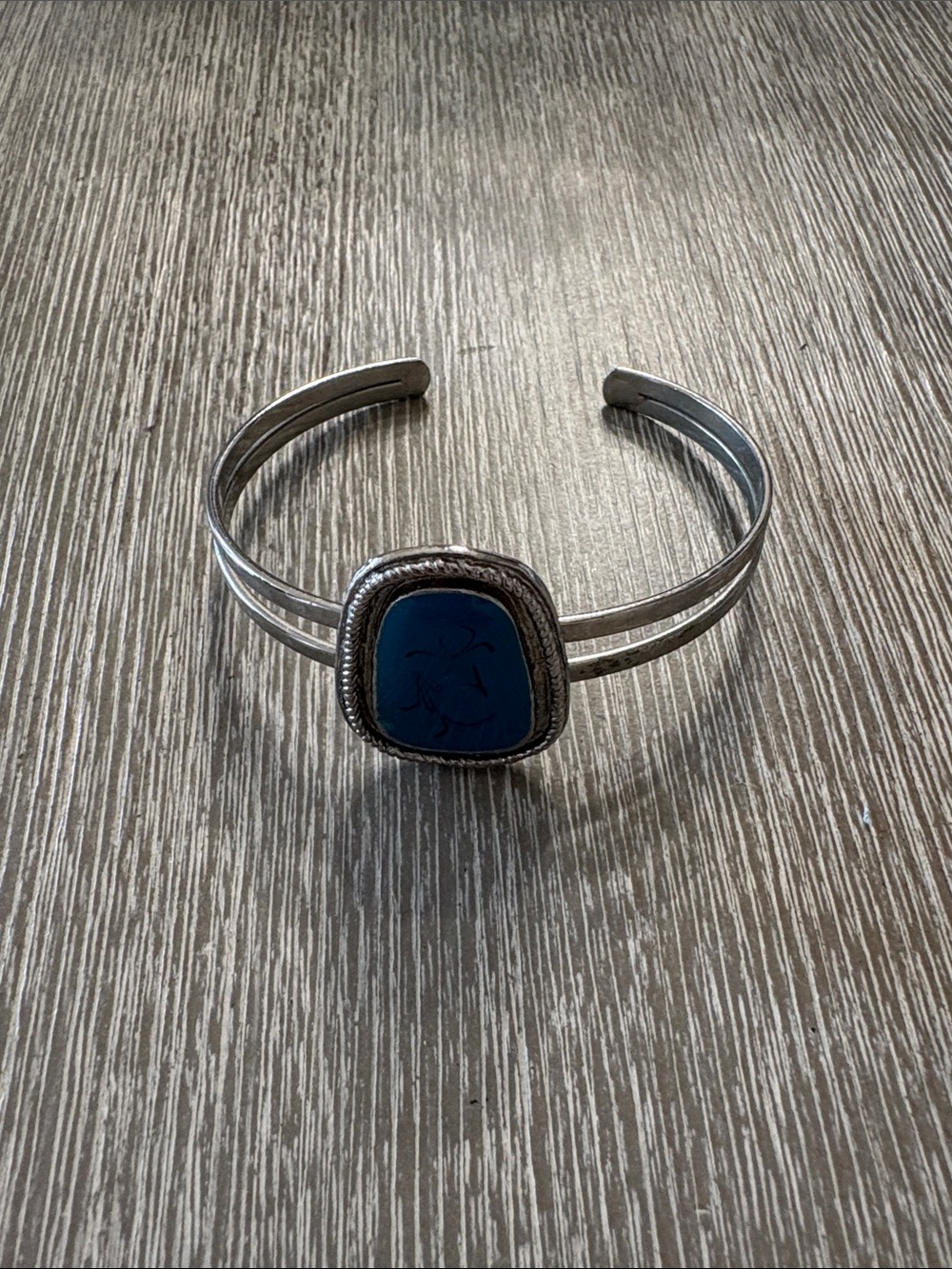 Silver-Tone Cuff Bracelet with Deep Blue Stone